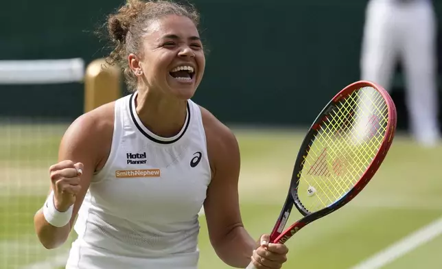 Jasmine Paolini of Italy celebrates after defeating Donna Vekic of Croatia in their semifinal match at the Wimbledon tennis championships in London, Thursday, July 11, 2024. (AP Photo/Mosa'ab Elshamy)