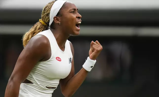 Coco Gauff of the United States reacts after winning g a point against Sonay Kartal of Britain during their third round match at the Wimbledon tennis championships in London, Friday, July 5, 2024. (AP Photo/Kirsty Wigglesworth)