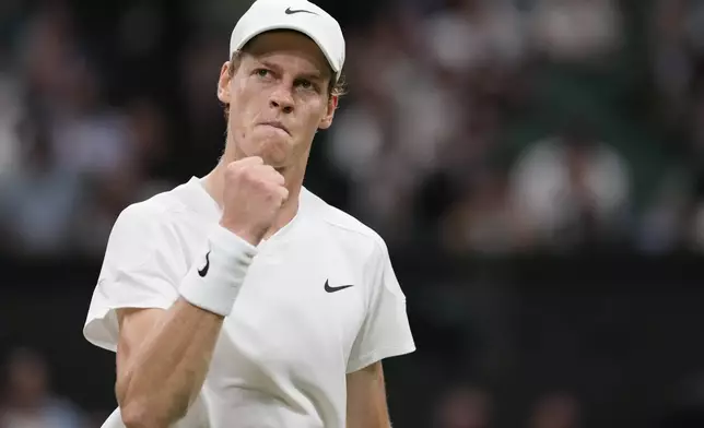 Jannik Sinner of Italy reacts after winning a point against Miomir Kecmanovic of Serbia in their third round match at the Wimbledon tennis championships in London, Friday, July 5, 2024.