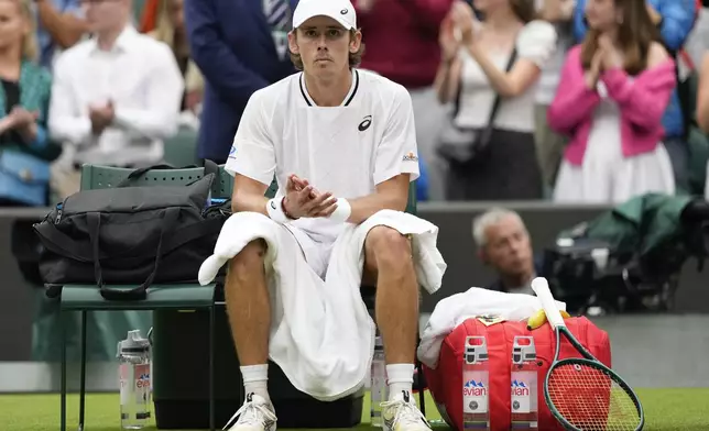 Alex de Minaur of Australia reacts following his fourth round win over Arthur Fils of France at the Wimbledon tennis championships in London, Monday, July 8, 2024. (AP Photo/Alberto Pezzali)