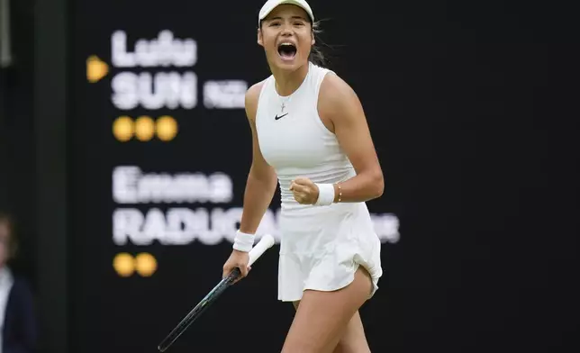 Emma Raducanu of Britain reacts after winning the second set against Lulu Sun of New Zealand during their fourth round match at the Wimbledon tennis championships in London, Sunday, July 7, 2024. (AP Photo/Alberto Pezzali)