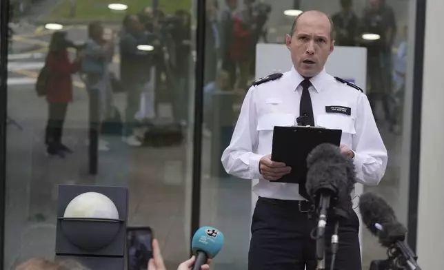 Chief Superintendent Jon Simpson of Hertfordshire Police speaks to media outside Hatfield Police Station after an incident in Bushey on Tuesday evening, in Hertfordshire, England, Wednesday, July 10, 2024. British police were hunting for a man believed to be armed with a crossbow after three women were killed in a house near London. Hertfordshire Police said Kyle Clifford, 26, was being sought over the suspected triple murder. (Jacob King/PA via AP)