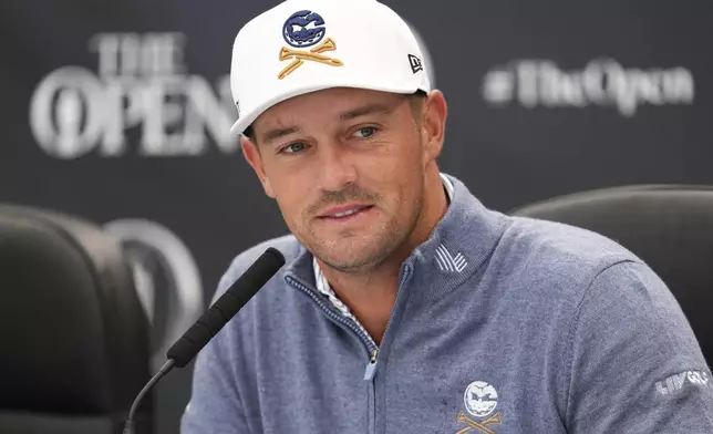 Bryson DeChambeau of the United States speaks during a press conference ahead of the British Open Golf Championships at Royal Troon golf club in Troon, Scotland, Tuesday, July 16, 2024. (AP Photo/Jon Super)