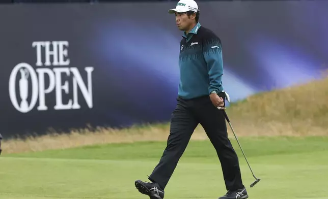 Hideki Matsuyama of Japan walks off the 18th green following his second round of the British Open Golf Championships at Royal Troon golf club in Troon, Scotland, Friday, July 19, 2024. (AP Photo/Scott Heppell)