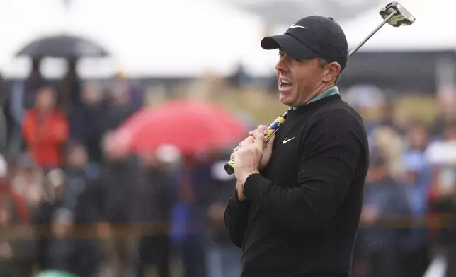 Rory McIlroy of Northern Ireland reacts after missing a birdie putt on the fourth green during his opening round of the British Open Golf Championships at Royal Troon golf club in Troon, Scotland, Thursday, July 18, 2024. (AP Photo/Peter Morrison)