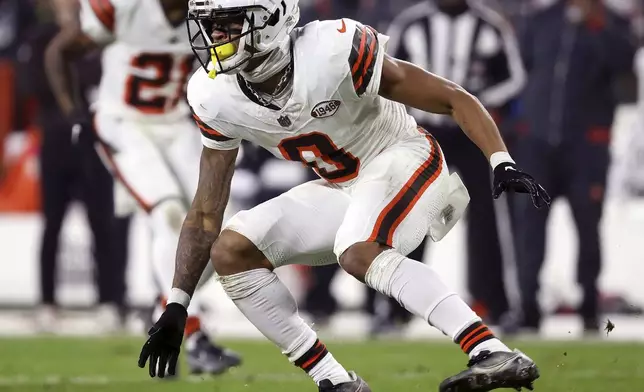 FILE - Cleveland Browns cornerback Greg Newsome II (0) drops back in coverage during an NFL football game against the New York Jets, Dec. 28, 2023, in Cleveland. Newsome has had surgery on an injured hamstring and tackle Dalvin Tomlinson is scheduled to undergo an arthroscopic procedure on his knee Friday, July 26, 2024. (AP Photo/Kirk Irwin, File)