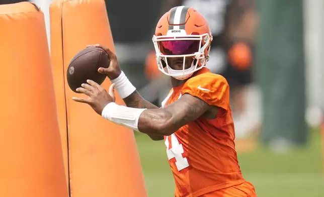 Cleveland Browns quarterback Deshaun Watson (4) throws during an NFL football training camp practice, Saturday, July 27, 2024, in White Sulphur Springs, W.Va. (AP Photo/Sue Ogrocki)