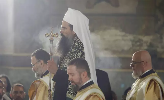 Newly elected Bulgarian Patriarch Daniil seen during his enthronement ceremony at Alexander Nevsky Cathedral in Sofia, Bulgaria, Sunday, June 30, 2024. Bulgaria's Orthodox Church on Sunday elected Daniil, a 52-year-old metropolitan considered to be pro-Russian, as its new leader in a disputed vote that reflects the divisions in the church and in the society. (AP Photo/Valentina Petrova)