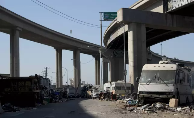 A homeless encampment is seen Thursday, July 25, 2024, in Oakland, Calif. California Gov. Gavin Newsom issued an executive order Thursday, July 25, to direct state agencies on how to remove homeless encampments, a month after a Supreme Court ruling allowing cities to enforce bans on sleeping outside in public spaces. (AP Photo/Godofredo A. Vásquez)