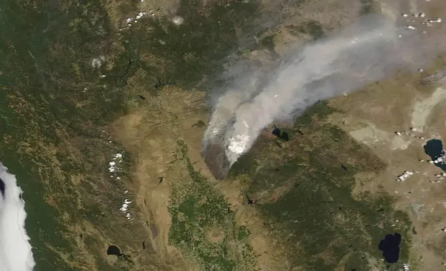 This satellite image provided by Maxar Technologies shows the overview of the Park Fire in Chico, Calif., on Friday, July 26, 2024. (Maxar Technologies via AP)