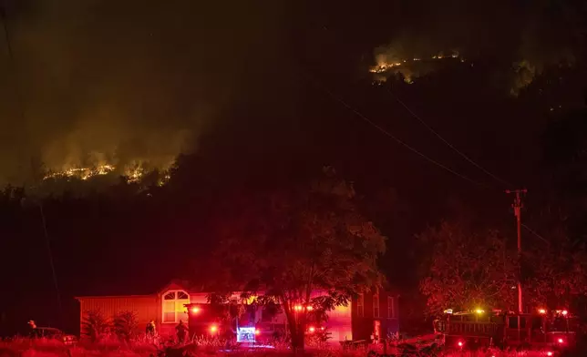 The Park Fire burns along Highway 36 near Dales, Calif., Monday, July 29, 2024. (AP Photo/Nic Coury)