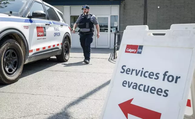 A reception centre is readied for wildfire evacuees forced from Jasper National Park in Calgary, Alta., Tuesday, July 23, 2024. (Jeff McIntosh/The Canadian Press via AP)