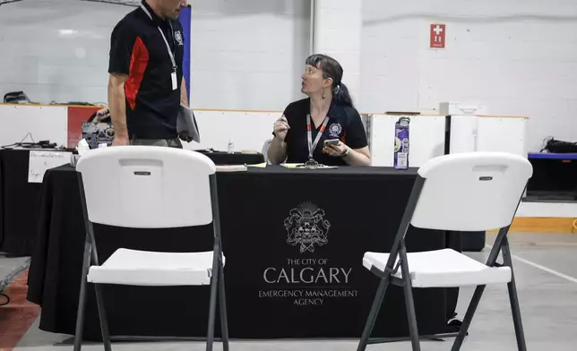 A reception center is readied for wildfire evacuees forced from Jasper National Park in Calgary, Alberta, Canada, Tuesday, July 23, 2024. (Jeff McIntosh/The Canadian Press via AP)