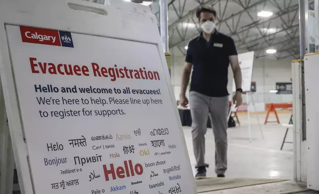 A reception centre is readied for wildfire evacuees forced from Jasper National Park in Calgary, Alta., Tuesday, July 23, 2024. (Jeff McIntosh/The Canadian Press via AP)