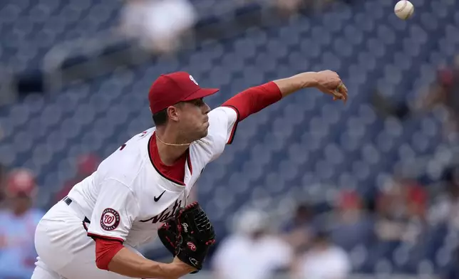 Washington Nationals pitcher MacKenzie Gore throws during the first inning of a baseball game against the St. Louis Cardinals at Nationals Park, Saturday, July 6, 2024, in Washington. (AP Photo/Mark Schiefelbein)