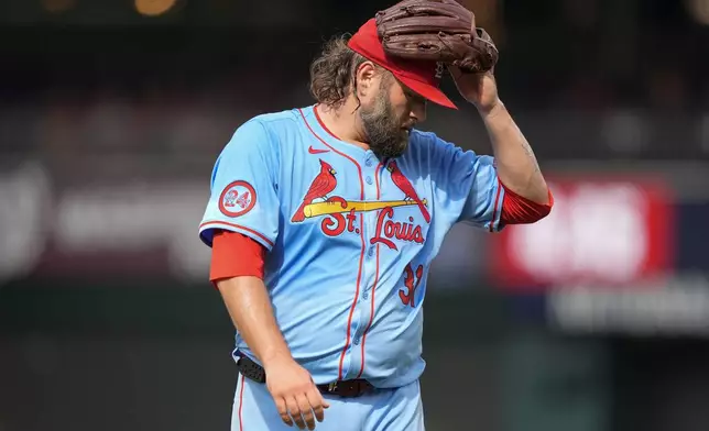 St. Louis Cardinals pitcher Lance Lynn (31) walks off the mound after the second inning of a baseball game against the Washington Nationals at Nationals Park, Saturday, July 6, 2024, in Washington. (AP Photo/Mark Schiefelbein)