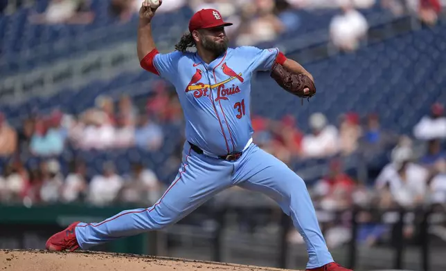 St. Louis Cardinals pitcher Lance Lynn throws during the first inning of a baseball game against the Washington Nationals at Nationals Park, Saturday, July 6, 2024, in Washington. (AP Photo/Mark Schiefelbein)