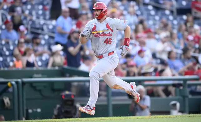 St. Louis Cardinals' Paul Goldschmidt runs toward home to score on a double by Brendan Donovan during the eighth inning of a baseball game against the Washington Nationals, Monday, July 8, 2024, in Washington. (AP Photo/Nick Wass)