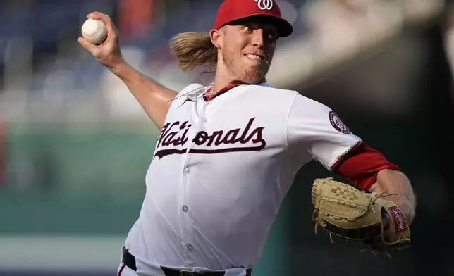 Washington Nationals pitcher Jordan Weems throws during a baseball game against the St. Louis Cardinals at Nationals Park, Saturday, July 6, 2024, in Washington. The Nationals beat the Cardinals, 14-6. (AP Photo/Mark Schiefelbein)