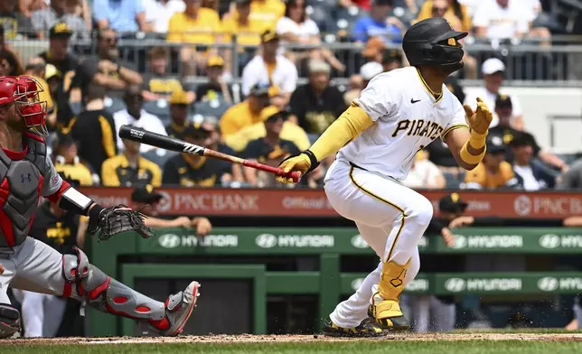 Pittsburgh Pirates' Joshua Palacios hits a single during the second inning of a baseball game against the St. Louis Cardinals in Pittsburgh, Wednesday, July 24, 2024. (AP Photo/Justin Berl)