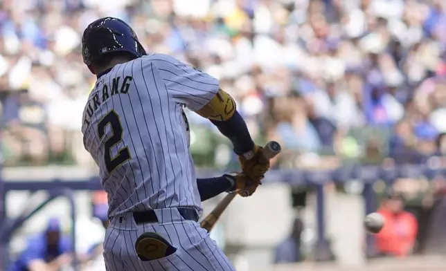 Milwaukee Brewers' Brice Turang hits a grand slam during the fourth inning of a baseball game against the Chicago Cubs Sunday, June 30, 2024, in Milwaukee. (AP Photo/Morry Gash)