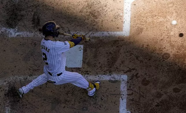 Milwaukee Brewers' Brice Turang hits a grand slam during the fourth inning of a baseball game against the Chicago Cubs Sunday, June 30, 2024, in Milwaukee. (AP Photo/Morry Gash)