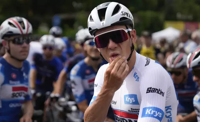 Belgium's Remco Evenepoel, wearing the best young rider's white jersey, waits for the start of the third stage of the Tour de France cycling race over 230.8 kilometers (143.4 miles) with start in Piacenza and finish in Turin, Italy, Monday, July 1, 2024. (AP Photo/Jerome Delay)