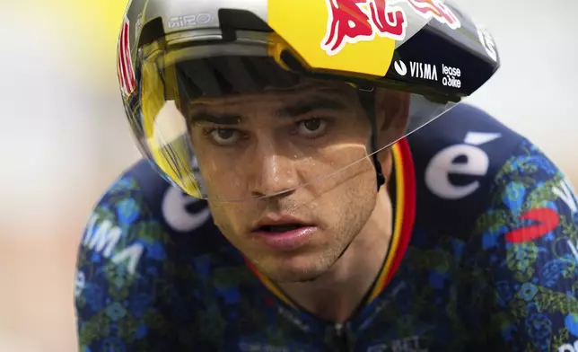 Belgium's Wout van Aert crosses the finish of the twenty-first stage of the Tour de France cycling race, an individual time trial over 33.7 kilometers (20.9 miles) with start in Monaco and finish in Nice, France, Sunday, July 21, 2024. (AP Photo/Daniel Cole)