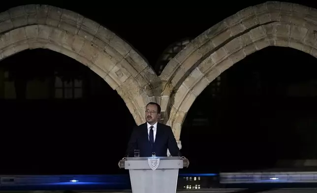 Cyprus' President Nikos Christodoulides talks during an event marking the 50th anniversary of the Turkish invasion on 1974, at the Presidential palace in the divided capital Nicosia, Cyprus, Saturday, July 20, 2024. Greek Cypriot commemorations include the unveiling of memorials to fallen heroes, church services and a gathering late Saturday at the Presidential Palace addressed — for the first time — by Greek Prime Minister Kyriakos Mitsotakis. (AP Photo/Petros Karadjias)