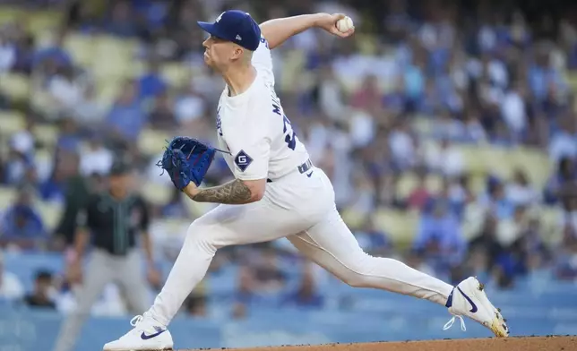 Los Angeles Dodgers starting pitcher Bobby Miller throws during the first inning of a baseball game against the Arizona Diamondbacks, Tuesday, July 2, 2024, in Los Angeles. (AP Photo/Ryan Sun)