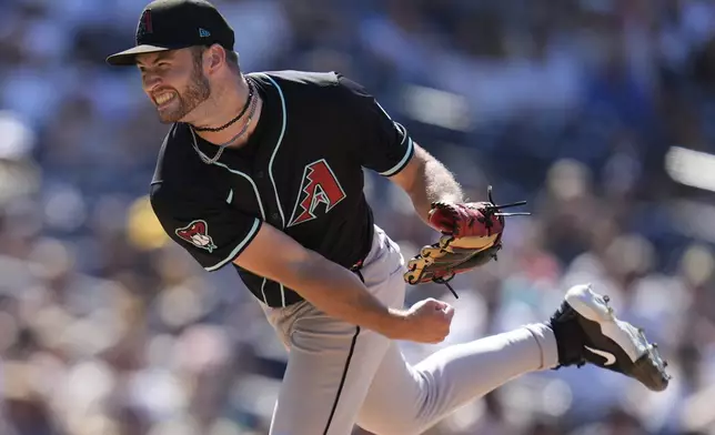 Arizona Diamondbacks relief pitcher Bryce Jarvis works against a San Diego Padres batter during the ninth inning of a baseball game Sunday, July 7, 2024, in San Diego. (AP Photo/Gregory Bull)