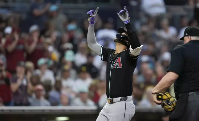 Arizona Diamondbacks' Lourdes Gurriel Jr. celebrates after hitting a home run during the fourth inning of a baseball game against the San Diego Padres, Saturday, July 6, 2024, in San Diego. (AP Photo/Gregory Bull)