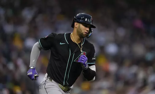 Arizona Diamondbacks' Lourdes Gurriel Jr. rounds the bases after hitting a home run during the fourth inning of a baseball game against the San Diego Padres, Saturday, July 6, 2024, in San Diego. (AP Photo/Gregory Bull)