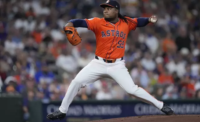 Houston Astros starting pitcher Framber Valdez delivers during the first inning of a baseball game against the Los Angeles Dodgers, Friday, July 26, 2024, in Houston. (AP Photo/Kevin M. Cox)