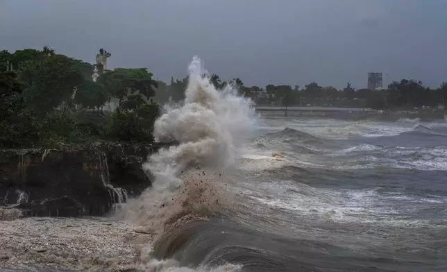 Waves from Hurricane Beryl hit the seawall in Santo Domingo, Dominican Republic, Tuesday, July 2, 2024. (AP Photo/Ricardo Hernandez)