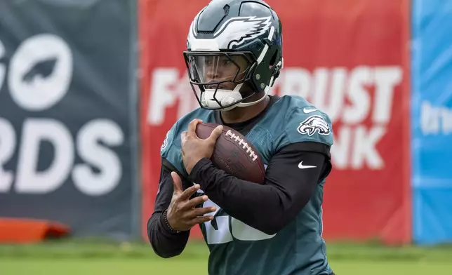 Philadelphia Eagles running back Saquon Barkley runs a drill during practice at NFL football training camp, Wednesday, July 24, 2024, in Philadelphia. (AP Photo/Chris Szagola)