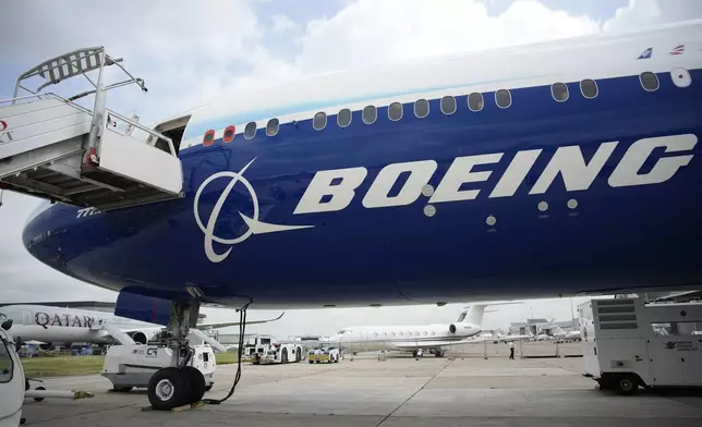 FILE - The Boeing 777X airplane is shown at the Paris Air Show in Le Bourget, north of Paris, France, on June 19, 2023. Boeing said Wednesday, July 31, 2024, that aerospace industry veteran Robert "Kelly" Ortberg will take over as CEO next week, replacing David Calhoun. Boeing is announcing the new CEO as it reports a loss of more than $1.4 billion in the second quarter. (AP Photo/Lewis Joly, File)