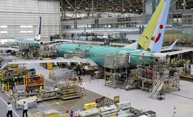 FILE - A Boeing 737 MAX aircraft is shown on the assembly line at the Boeing facility in Renton, Wash., June 25, 2024. Boeing reports earnings on Wednesday, July 31, 2024. (Jennifer Buchanan/The Seattle Times via AP, Pool, File)