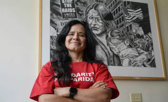 Executive Director of Voces de la Frontera Christine Neumann-Ortiz poses for a picture in her office Monday, July 1, 2024, in Milwaukee. (AP Photo/Morry Gash)