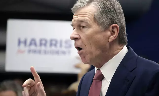 N.C. Governor Roy Cooper speaks at a press conference, Thursday, July 25, 2024, in Raleigh, N.C. Cooper is one of the people being considered to be likely Democratic presidential candidate Vice President Kamala Harris' running mate. (AP Photo/Chris Seward)