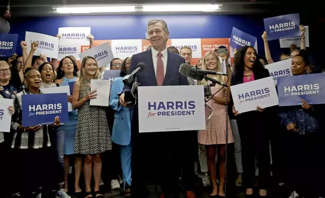 N.C. Governor Roy Cooper speaks at a press conference, Thursday, July 25, 2024, in Raleigh, N.C. Cooper is one of the people being considered to be likely Democratic presidential candidate Vice President Kamala Harris' running mate. (AP Photo/Chris Seward)