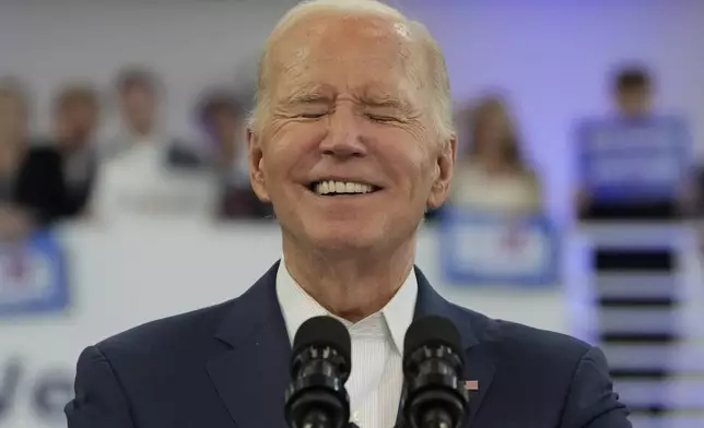 President Joe Biden pauses as he speaks to supporters at Renaissance High School, Friday, July 12, 2024, during a campaign event in Detroit. (AP Photo/Jacquelyn Martin)