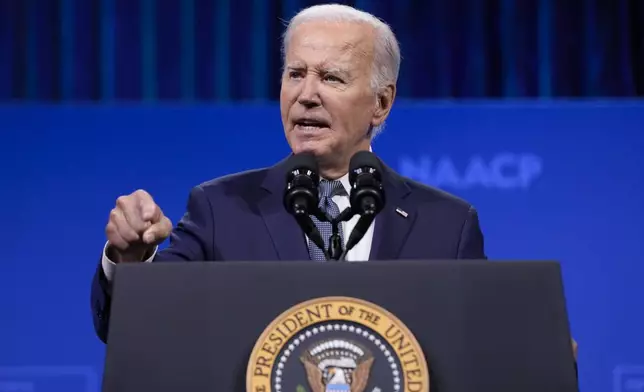 FILE - President Joe Biden speaks at the 115th NAACP National Convention in Las Vegas, July 16, 2024. Democrats at the highest levels are making a critical push for Biden to reconsider his election bid. Former President Barack Obama has privately expressed concerns to Democrats about Biden's candidacy. And Speaker Emerita Nancy Pelosi privately warned Biden that Democrats could lose the ability to seize control in the House if he didn't step away from the race. Biden says he's not dropping out believing he's best to beat the Republican Trump. (AP Photo/Susan Walsh, File)