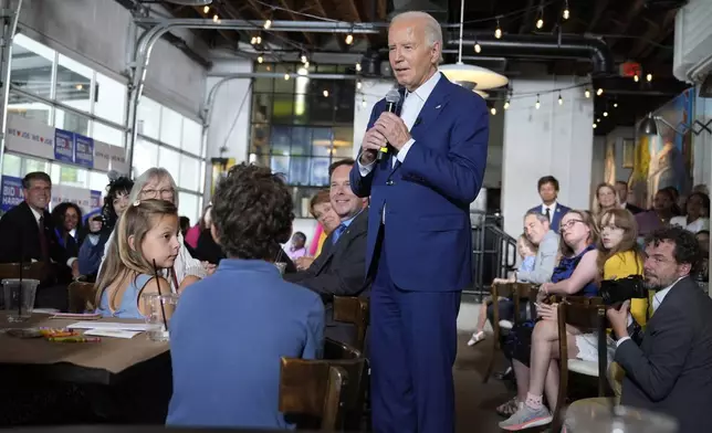 President Joe Biden speaks to supporters at Garage Grill &amp; Fuel Bar during a campaign stop in Northville, Mich., Friday July 12, 2024. (AP Photo/Jacquelyn Martin)