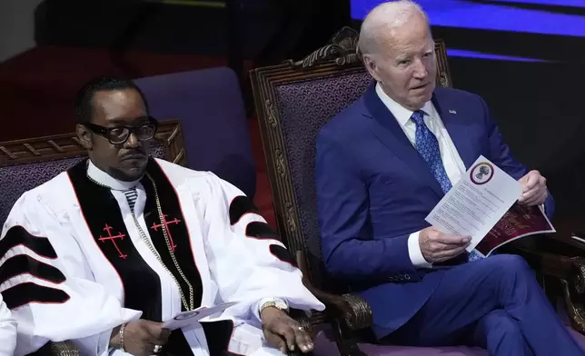 President Joe Biden, right, and pastor Dr. J. Louis Felton sit during a church service at Mt. Airy Church of God in Christ, Sunday, July 7, 2024, in Philadelphia (AP Photo/Manuel Balce Ceneta)