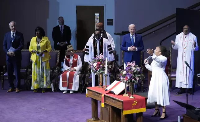 Bishop Ernest C. Morris, Sr., from right, President Joe Biden, pastor Dr. J. Louis Felton and Sen. Bob Casey, D-Pa., from left, and Philadelphia Mayor Cherelle Parker attend a church service at Mt. Airy Church of God in Christ, Sunday, July 7, 2024, in Philadelphia (AP Photo/Manuel Balce Ceneta)