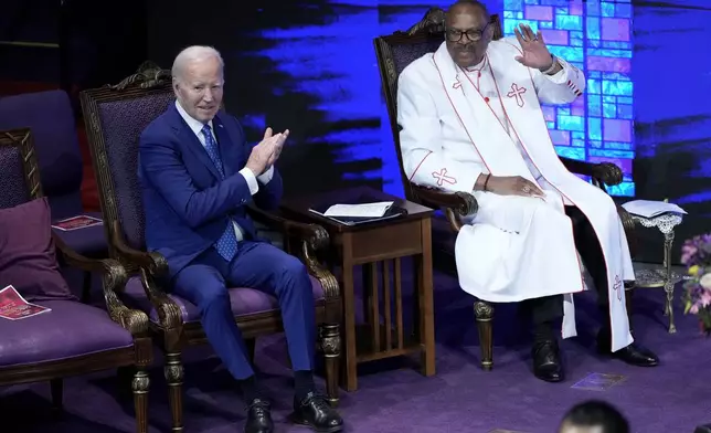 President Joe Biden, left, sits with Bishop Ernest C. Morris, Sr., at a church service at Mt. Airy Church of God in Christ, Sunday, July 7, 2024, in Philadelphia (AP Photo/Manuel Balce Ceneta)