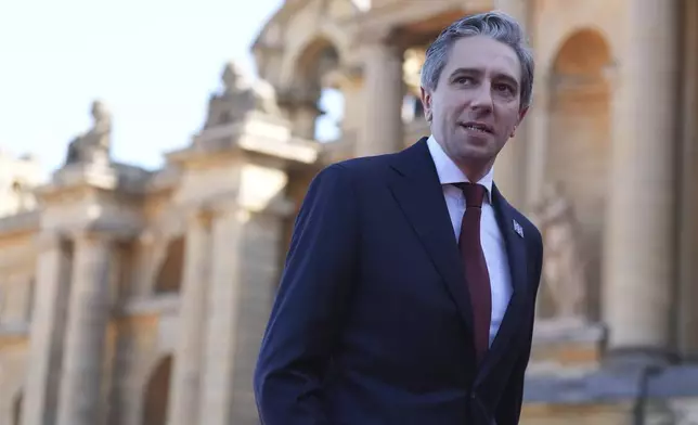 FILE - Ireland's Prime Minister Simon Harris arrives to attend the European Political Community summit at Blenheim Palace in Woodstock, Oxfordshire, England, Thursday, July 18, 2024. U.S. President Joe Biden's withdrawal from the U.S. presidential race injects greater uncertainty into the world. There was an outpouring of affection from Ireland's Prime Minister Harris, who called Biden a "proud American with an Irish soul.” (Jacob King/Pool Photo via AP, File)