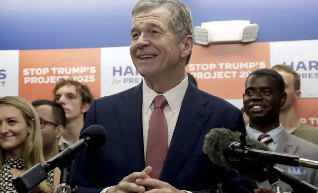 N.C. Governor Roy Cooper speaks at a news conference, Thursday, July 25, 2024, in Raleigh, N.C. Cooper is one of the people being considered to be Democratic presidential candidate Vice President Kamala Harris' running mate. (AP Photo/Chris Seward)