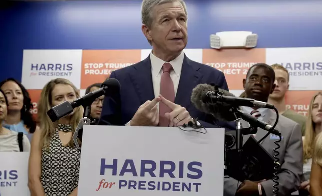 N.C. Governor Roy Cooper speaks at a news conference, Thursday, July 25, 2024, in Raleigh, N.C. Cooper is one of the people being considered to be Democratic presidential candidate Vice President Kamala Harris' running mate. (AP Photo/Chris Seward)